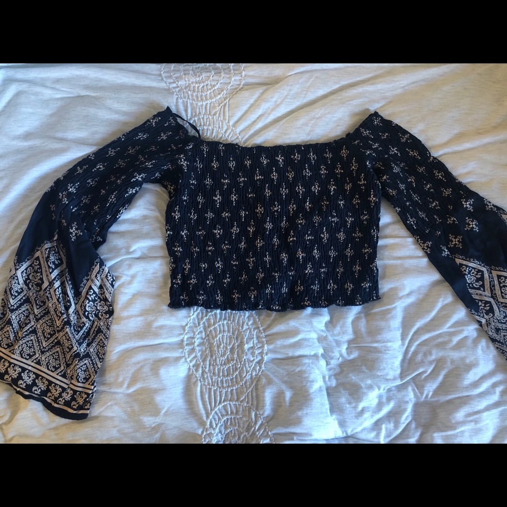 Smocked crop top with flows sleeves